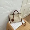 Bolso ligero de nailon para mujer, nuevo estilo 2026, bolso de hombro de nicho de lujo, bolso tote de alta gama para el trabajo