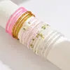 Pulsera Bohemia de Conchas de Color Contrastante y Perlas de Arroz de Nuevo Estilo Transfronteriza Europea y Americana Conjunto de Pulseras de Perlas de Arroz Multicapa de Moda y Versátil