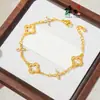 Nuevo Collar de Trébol de Cuatro Hojas Clásico Color Dorado Arena para Mujer Diseño de Nicho de Moda Simple Versátil Cadena para Clavícula Joyería al por Mayor