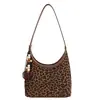 Bolso de mano retro de moda transfronterizo, bolso tipo concha, bolso de mujer, nuevo estilo Otoño 2026, textura, lujo ligero, bolso de hombro único, bolso para el trabajo, bolso de axila