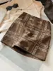 Falda Corta de Gamuza Bordada Jacquard Vintage para Mujer, Nueva Otoño de Cintura Alta Adelgazante Anti-Exposición Línea A