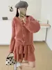 Conjunto de Suéter Estilo Suave Coleção Outono/Inverno 2026: Conjunto de Duas Peças: Cardigã de Tricô com Laço nas Costas + Saia para Mulheres