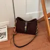 Bolsa vintage esmerilada de otoño e invierno para mujer, nuevo bolso cruzado versátil de moda 2026, bolso de hombro tipo cubo popular para ir al trabajo