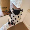 Bolso único de lunares para mujer, modelo nuevo 2026, bolso cruzado versátil de color block, mini bolso para teléfono, bolso pequeño