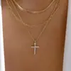 Moda de lujo transfronteriza europea y americana de alta gama, collar de traje, personalidad de nicho, cadena de suéter de cruz multicapa para mujer