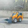 Cargadora compacta de operador montado para giro in situ y remoción de tierra, Vehículo de transporte cargador pequeño con ruedas y orugas para uso agrícola