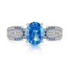 Xiaohongshu Douyin Más Vendido Anillo de Huevo de Paloma con Corte de Flor de Hielo de Piedra Preciosa de Color Incrustado con Anillo de Diamante de Alto Carbono Brillante Transmisión en Vivo