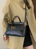 Bolsa Satchel de Camurça Retrô para o Dia a Dia de Mulheres 2025 Nova Tendência Moda Bolsa Kelly de Alto Padrão Grande Capacidade Bolsa Platina