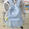 Mochila de nailon de color liso de alta moda 2026, bolsa de secundaria moderna y ligera con gran capacidad