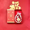 Regalo de Moda Paz y Alegría Llavero para Teléfono Móvil Colgante para Bolso Dibujo Animado Joyería Creativa Set de Caja de Regalo de Gama Alta