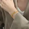 Pulsera de flor de piedra natural turquesa estilo barroco acero de titanio oro de 18K sin decoloración personalidad de nicho temperamento pulsera versátil