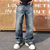 2026 Verano Hombres Nuevo Retro Americano Azul Simple Versátil Texturizado Holgado Recto Pierna Ancha Pantalones de Hombre Tendencia