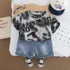 Conjunto de Verano para Bebé Niño 2026 Nueva Ropa Infantil Niños Verano Letra Manga Corta Atractivo Conjunto de Dos Piezas Moderno Venta al por Mayor