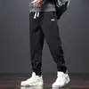 Calça Casual Transfronteiriça Outono Novo Estilo Juventude Marca Tendência Masculina Solta Esportiva Jogger Cintura Elástica Calça Casual Masculina
