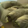 Novo conjunto de quatro peças com bordado de concha em fio fofo, design liso, lavável à máquina, adequado para camas de solteiro e casal, dormitórios estudantis e pousadas