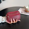 Nova Carteira de Moedas de Couro Portátil Pequena Versátil Bolsa para Guardar Fones de Ouvido Moderna Porta-Moedas Porta-Cartões Pequeno de Mão
