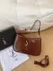 Suministro transfronterizo 2026 nuevo modelo bolso de mujer de cuero genuino de alta gama, bolso de axila con textura premium, bolso hobo