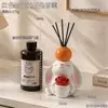 Adorno aromático con forma de conejo de orejas caídas sosteniendo una flor, con portavelas, adecuado para dormitorio, escritorio y decoración del hogar, creando una atmósfera acogedora, una gran decoración de regalo para el hogar
