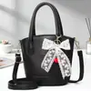 Bolso de Mano Casual tipo Cesta, Bolso Cubo de Moda para Viajar, Bolso Cruzado Versátil con Colgante, Bolsos Transfronterizos