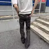 Jeans de brim cru estilo americano Cleanfit de quatro costuras, corte justo e estreito, versátil, levemente flare, com efeito fluido e emagrecedor, e design de comprimento total para homens