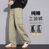 Calça de trabalho masculina de algodão estilo americano para o outono, apresentando um design retrô, minimalista e sofisticado com múltiplos bolsos e corte reto para um visual casual.