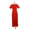 Vestido de Punto Hueco Estilo Nuevo de Verano en Stock Venta al por Mayor Cuello Redondo Manga Corta Botones al Frente Cintura Ajustada Abertura Vestido Largo
