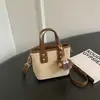 Bolso cruzado pequeño minimalista de moda transfronterizo para mujer, estilo retro 2026 nuevo, bolso cruzado diario para ir al trabajo, bolso tipo cubo tote casual