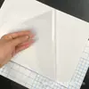 Película Láser Holográfica Mixta Autoadhesiva A4 Película de Laminación en Frío Película Láser Colorida Copo de Nieve Corazón Estrella Molino de Viento Estándar Americano