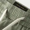Pantalones de verano nuevos, shorts casuales para hombre, ropa de exterior de moda, pantalones cargo casuales elásticos con cordón, shorts casuales versátiles de pierna recta