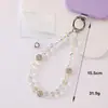 Cadena para teléfono de cristal con lazo incrustado de diamantes de alta gama, minimalista y lujosa, con un diseño fresco y delicado, que sirve como correa para teléfono, accesorio para la muñeca o adorno colgante