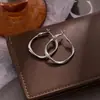 Brincos de argola Mobius face redonda afinamento círculo grande alta sensibilidade luxo leve temperamento brincos irregulares brincos atacado