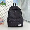 Mochila Ensino Fundamental Meninas Vibe Romântica Bolinhas Laço Versátil Alta Aparência Mochila para Alunas do Ensino Médio