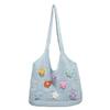 Bolsa de punto calada de nuevo estilo para el verano 2025, bolsa tejida de un solo hombro, gran capacidad, para el trabajo, bolsa tote floral de alta gama para mujer