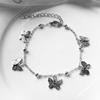 Pulsera con colgante de mariposa caliente transfronteriza de Europa y Estados Unidos, temperamento de personalidad simple, tobillera de playa, joyería para el pie, mano de mariposa hueca