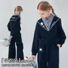 Conjunto de Moletom e Calça de Moletom Estilo College Feminino Primavera 2026 Novo Estilo Patchwork Xadrez Gola Azul Marinho Conjunto de Duas Peças