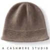 Gorro de punto 100% cachemir puro para mujer, nuevo estilo otoño/invierno, tejido, cálido, engrosado, con protección para las orejas y diseño con capucha