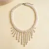 Collar de borla con cuentas de vidrio perlado vintage europeo y americano, cadena para la clavícula de nicho de alta gama, accesorio elegante simple y con estilo para mujer