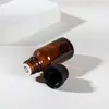 Venta al por mayor de fábrica Botella transparente de 5 ml para aceites esenciales Botella de vidrio de 10 ml Sub-botella cosmética de 50 ml