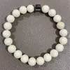 Europa y Estados Unidos transfronterizo más vendido piedra natural piedra volcánica piedra ojo de tigre pulsera de cuentas masculina imán pulsera magnética comercio exterior al por mayor
