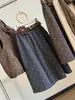 Falda versátil de mezcla de lana con lunares estilo coreano, nueva colección otoño/invierno, corte holgado, línea A, que cubre la cadera, falda midi de cinco puntos