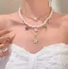 Collar de Perlas y Estrellas de Múltiples Capas Estilo Resort con un Diseño Elegante para Sesiones de Fotos en la Playa