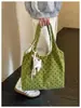 Bolso tote minimalista de lunares transfronterizo para mujer, nueva colección 2026, bolso de mano y bandolera versátil de alta gama de pana
