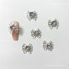 Celebridad de Internet oro belleza chica lazo nueva uña amor joyería taladro de uñas resina pila diamante accesorios para uñas