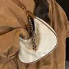 Bolsa de Design de Nicho em Forma de Meia-Lua Feminina 2025 Novo Estilo Coreano Retrô Ombro Único Transversal Pequena Bolsa Estilo Ocidental Bolsa de Dumpling Transfronteiriça