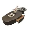 Mesa de centro irregular de diseño minimalista italiano, con forma de cacahuete y cajones de almacenamiento, combinada con una mesita auxiliar de cristal para formar un juego completo de mesa de centro para sala de estar