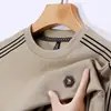 Nueva Camiseta de Manga Larga Casual con Cuello Redondo y Estampado para Hombre de Mediana Edad, Nueva Colección Primavera 2026, Transfronteriza