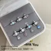 Nuevos Pendientes de Tuerca Saturno Gota de Agua Dulces y Frescos Estilo Ins para Mujer, Pendientes de Perforación Versátiles y Accesorios al por Mayor