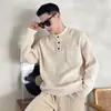 Suéter de cuello alto medio diseño para hombre popular tejido trenzado engrosado base suelta estilo perezoso top de moda ins
