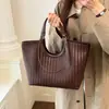 Bolso de hombro ins de color liso a la moda estilo coreano, bolso tote tejido de gran capacidad, bolso de mano con diseño de nicho único y moderno