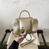 Nuevo bolso de hombro para mujer con forma de elefante lindo transfronterizo, bolso de mano de cuero PU, bolso cruzado, bolsa pequeña de dibujos animados multicolor